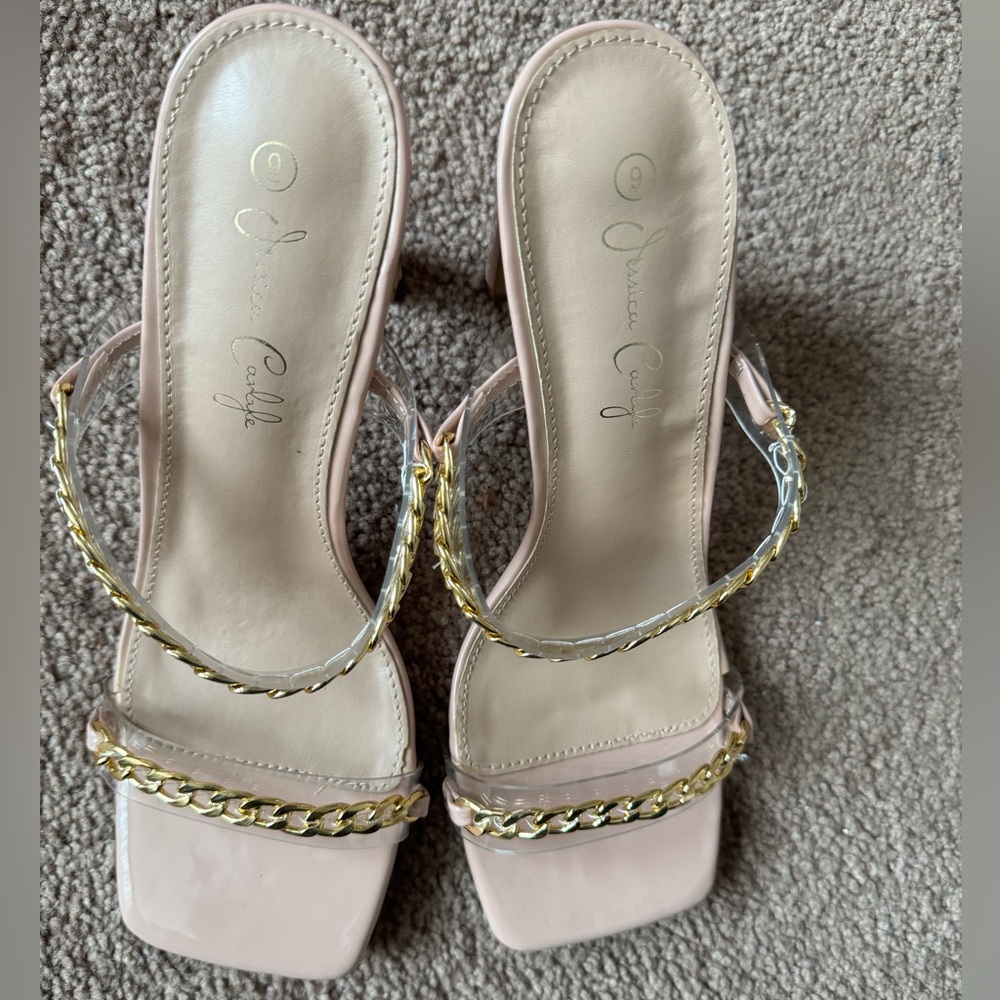 Brand New super cute heeled sandal with faux chain.